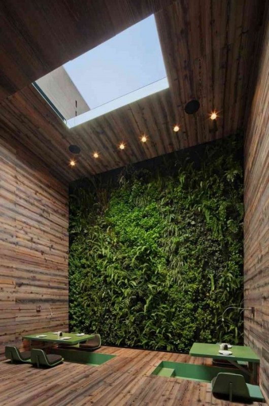 Green wall of Impressive Restaurant with Beautiful Net Facade.jpg